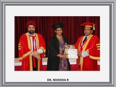 Dr. Nivedha R